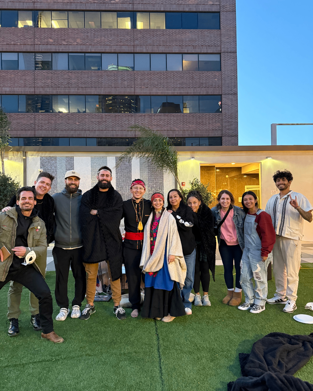 Community group photo after an evening gathering