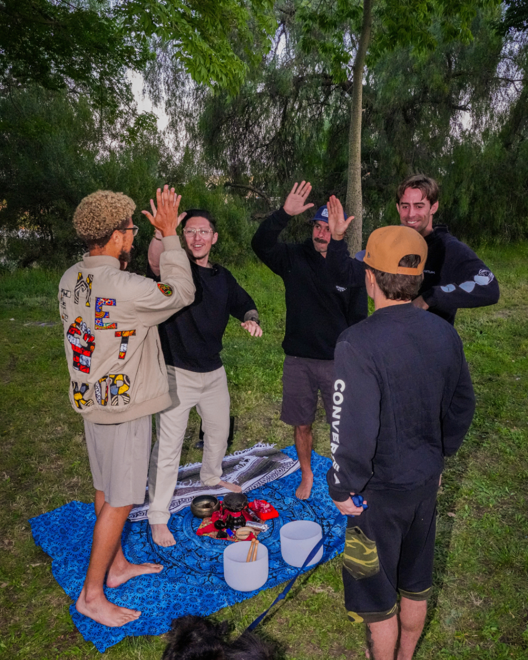 Outdoor group practice during a men's wellness experience