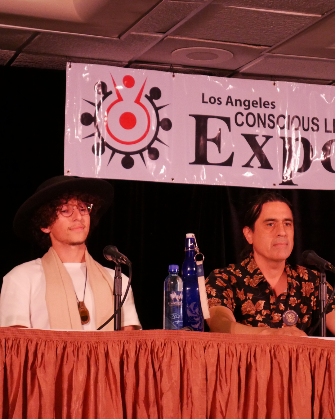 Tristan speaking on a panel at a live event