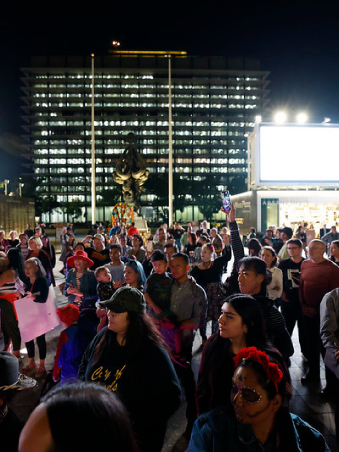 A community gathered for an outdoor ceremony