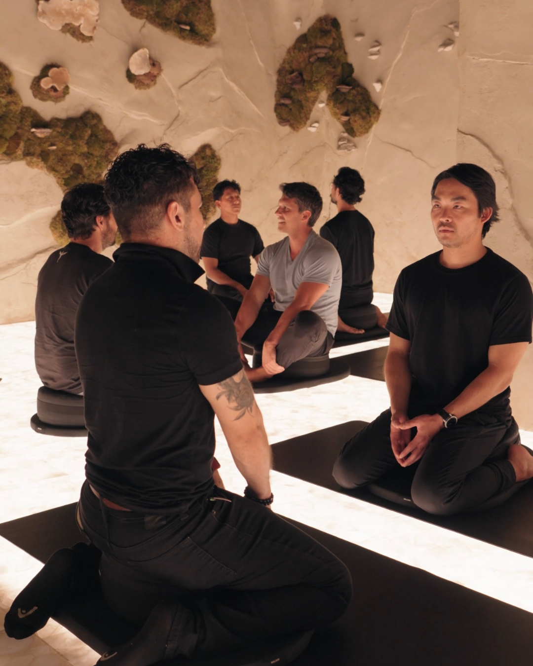 Men connecting in circle at a previous Men's Wellness Night